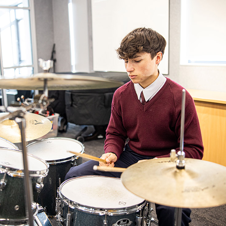 Student playing drums at Marian Catholic College Kenthurst